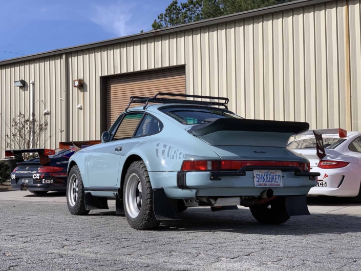 rear view of a Custom Built 1988 Porsche 930 Turbo with Meissen Blue exterior and Carrera fabric interior