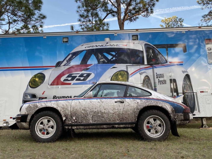Custom Built 1982 Porsche 911 SC with Brumos Livery Exterior and Porsche Tartan Interior parked in front of a mural