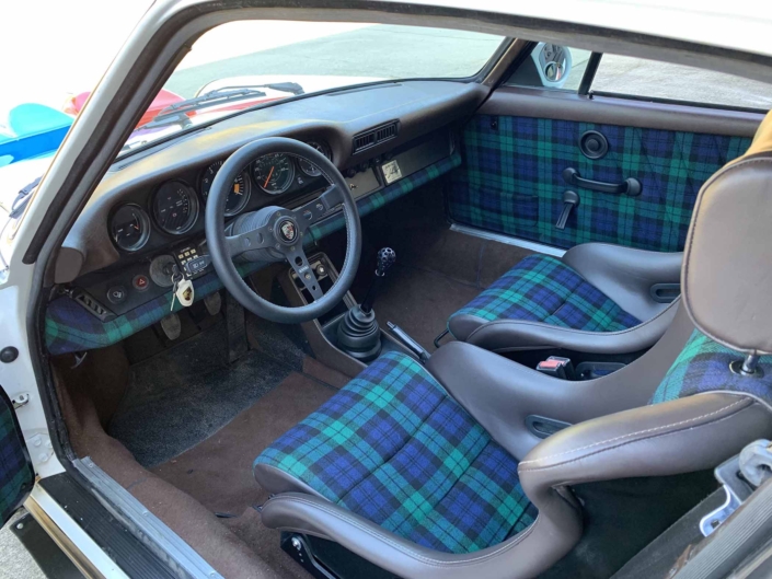 front seating in a Custom Built 1982 Porsche 911 SC with Brumos Livery Exterior and Porsche Tartan Interior