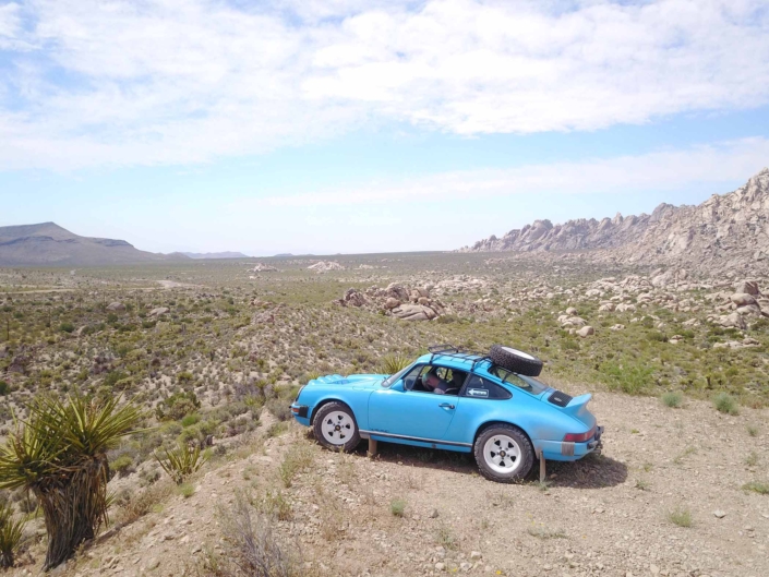 Custom Built 1980 Porsche 911 SC in Riviera Blue parked in the desert