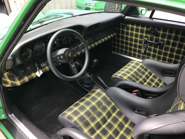 Custom Porsche Tartan Interior on a 981 Porsche 911 SC in Signal Green