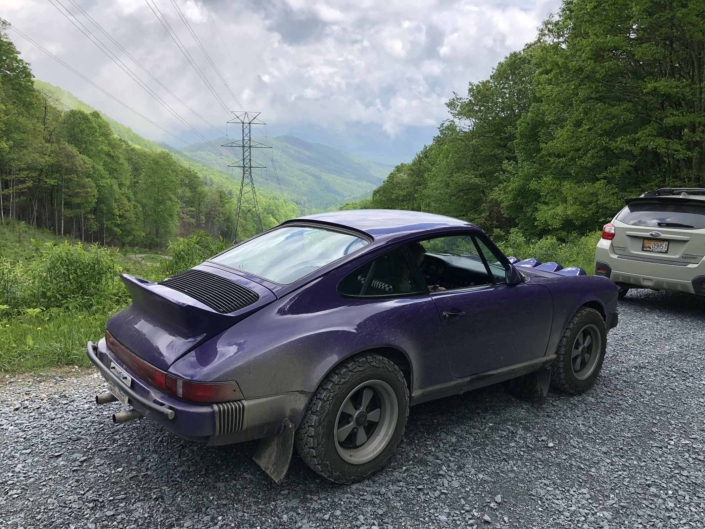 side view of Leh Keen's Custom Built 1978 Porsche 911 SC with Lilac exterior and Pascha interior
