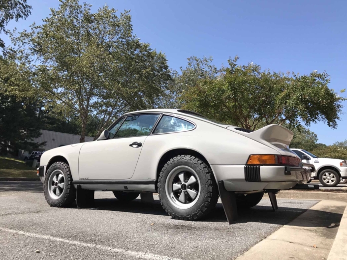 3/4 side view of a Custom Built 1986 Porsche 911 Carrera with Fashion Grey Exterior and Lancia Fabric Interior