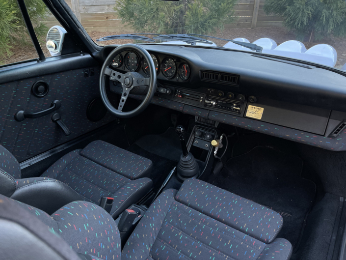 Interior view of Leh Keen's Custom 1983 930 Turbo in Moonstone with "Windows 95 in color" fabric
