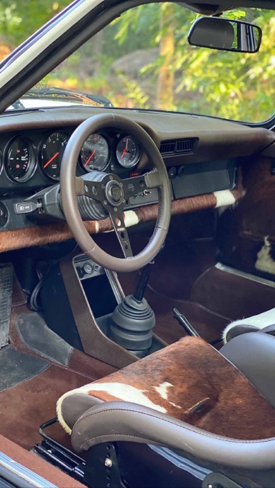 front wheel shot of a Custom Built 1981 Porsche 911 SC with Grand Prix White exterior and Cow Interior