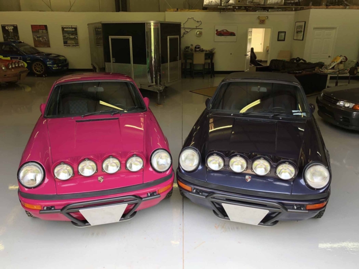 Custom Built 1988 Porsche 911 Carrera with Ruby Stone Exterior and Mercedes Fabric Interior parked in a garage