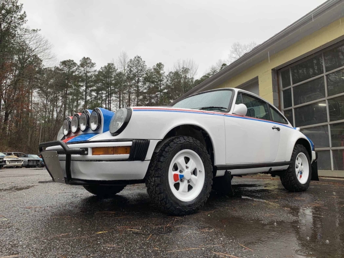 freshly cleaned Custom Built 1982 Porsche 911 SC with Brumos Livery Exterior and Porsche Tartan Interior