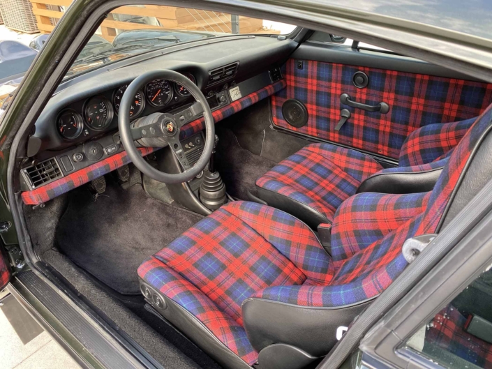 interior shot of a Custom Built 1986 Porsche 930 Turbo with Oak Green Metallic Exterior and Porsche tartan interior