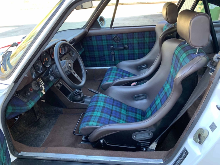 Custom Built 1982 Porsche 911 SC with Brumos Livery Exterior and Porsche Tartan Interior with the door open showcasing the custom interior