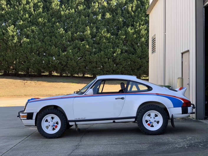 side view of a Custom Built 1982 Porsche 911 SC with Brumos Livery Exterior and Porsche Tartan Interior