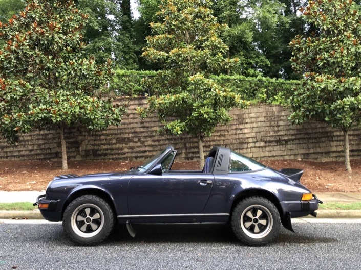 Custom Built 1986 Porsche 911 Carrera with Shwartz Exterior and Mercedes G Fabric Interior with the top down