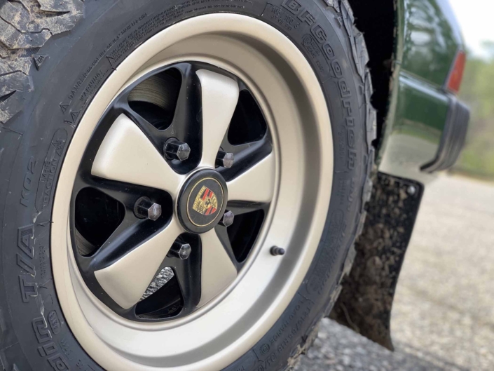 tire shot of Custom built 1982 Porsche 911 SC in Irish Green with VW tartan interior