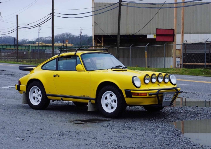 side view of a Custom Built 1988 Porsche 911 Carrera with Cadmium Yellow exterior and Opel fabric interior