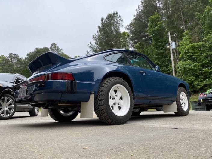 rear view of a Custom Built 1987 Porsche 911 Carrera with Aga Blue exterior and Carrera fabric interior