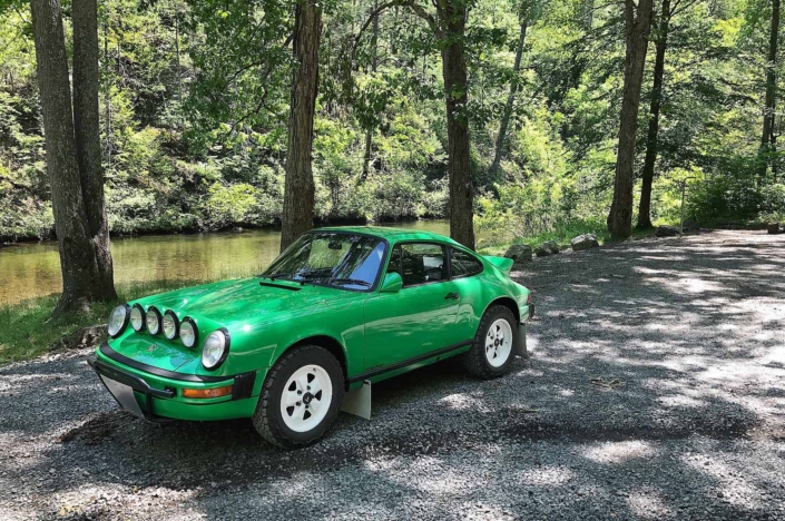 side view of Leh Keen's Custom Built 1981 Porsche 911 SC in Signal Green with Porsche Tartan Interior