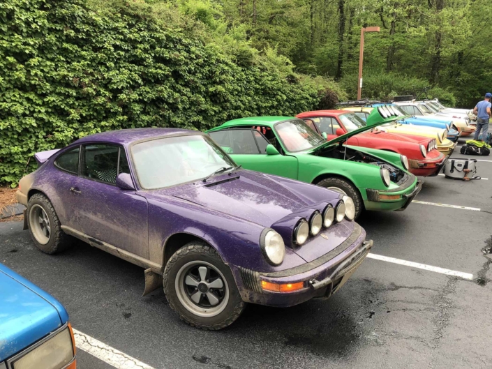 Custom Built 1978 Porsche 911 SC with Lilac exterior and Pascha interior parked in a lineup of Custom Porsche's