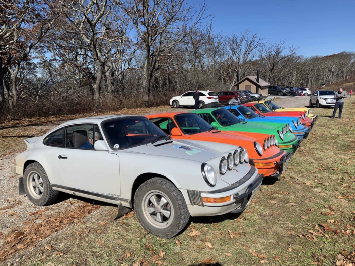 Custom Built 1986 Porsche 911 Carrera with Fashion Grey Exterior and Lancia Fabric Interior parked in a lineup of custom porsche's