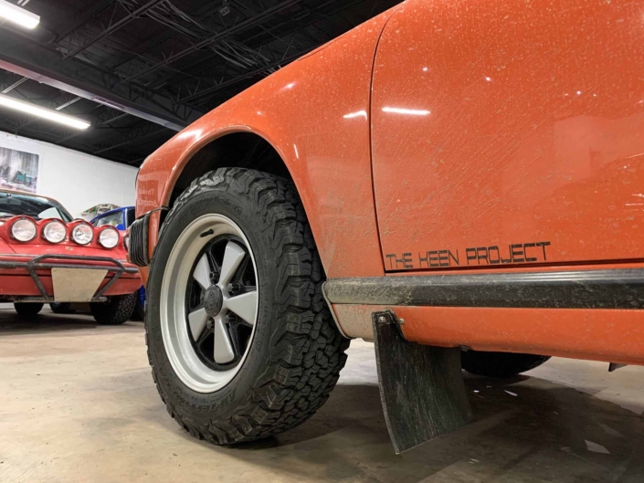 Custom built 1987 Porsche 911 Carrera with Continental Orange exterior and VW tartan interior