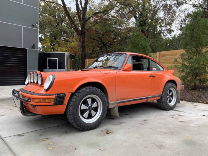 Custom built 1987 Porsche 911 Carrera with Continental Orange exterior and VW tartan interior