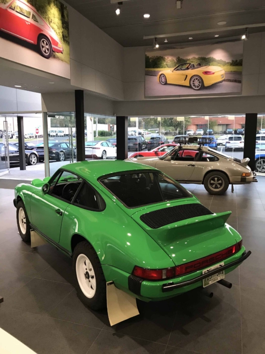 rear view of the Custom Built 1981 Porsche 911 SC in Signal Green with Porsche Tartan Interior