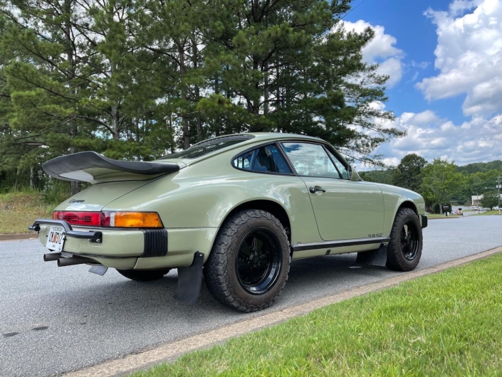 Side Exterior View of Leh Keen's Custom 1985 911 Carrera in Stone Grey with factory Porsche fabric