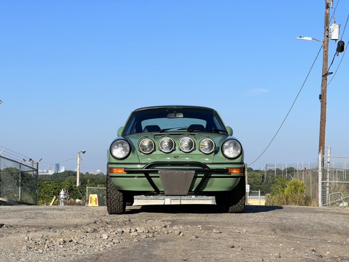 Leh Keen's Custom Built 1984 911 Carrera parked outside on a nice day